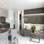 sala de estar tropical toscana con sofa cama